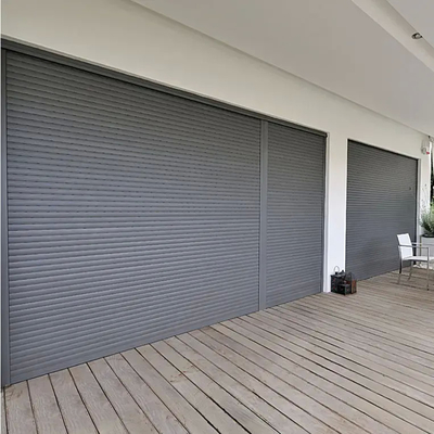 Portas remotas da garagem do furacão de alta qualidade dos obturadores da tempestade da casa com sistema de segurança
